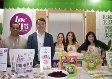 The team of Love Beets proudly show all the products they have on display.